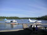 N21PG @ 2R3 - Alaska West Air Dehavilland DHC-3, N21PG and N87AW docked at 2R3 (Island Lake-Kenai, AK). - by Mark Kalfas