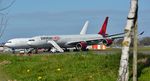 9H-PPE @ EGHH - Parked in the trees - by John Coates
