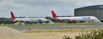 9H-EAL @ EGHH - Parked with 2-EALK - by John Coates