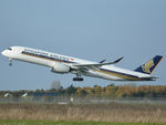 9V-SMW @ EKCH - RWY22R from St. Magleby - by Lars Baek