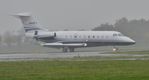 N92FT @ EGHH - Arriving in pouring rain - by John Coates