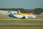 N402AS @ KMCO - Boeing 737-990/ER - by Mark Pasqualino