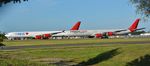 G-VFIT @ EGHH - Parked with 9H-EAL - by John Coates