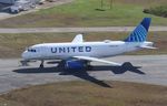 N818UA @ KLCQ - Airbus A319-131