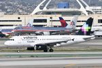 XA-VOC @ KLAX - Volaris A319, XA-VOC at LAX - by Mark Kalfas