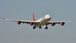 9H-EAL @ EGHH - Distant approach to 08 - by John Coates