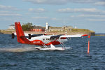 HB-LWB @ EKCC - Taxing for start outside the Harbour, with 3 Kroner in the background