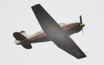 G-YAKJ @ EGHH - Flypast in bad weather - by John Coates