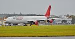 9H-PPE @ EGHH - Being towed for departure - by John Coates