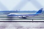 4X-AXD @ KORD - Photographed through a chain-link fence - by Glenn E. Chatfield