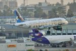 N204FR @ KLAX - Frontier Airbus A320-214, on 25L approach LAX - by Mark Kalfas