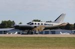 N1421Z @ KOSH - Socata TBM-700 - by Mark Pasqualino