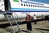 EZ-A101 @ UTAT - Holy Woman blessing EZ-A101 at Da?oguz (Dashoguz) Airport. Turkmenistan during publicity tour - by Neil Foster