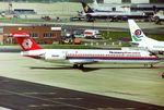 SE-DHG @ EGKK - At London Gatwick early 1992.