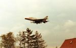 G-748 @ EKVL - F-100D G-748 from Royal Danish Air Force seen on final 
approach to runway 28 at Vaerloese Air Base in 
Denmark in 1970. Photo taken from the home garden, 
when I was a boy. - by Jan Lundsteen-Jensen