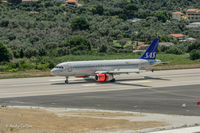 OY-KAT @ JSI - Landing at Skiathos - by Andy Collins