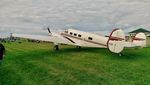 N412K @ KOSH - 1946 Beech D18S, N412K - by Mark Kalfas