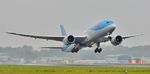 G-TUIJ @ EGHH - Climbing away from 26 - by John Coates