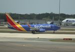 N457WN @ KMCO - Boeing 737-7H4 - by Mark Pasqualino