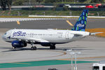 N646JB @ LAX - at lax - by Ronald