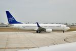 EI-DMZ @ KORD - FUTURA Boeing 737-8FH, EI-DMZ, preparing to depart RWY 27L at ORD. - by Mark Kalfas