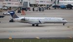 N165GJ @ KMIA - GoJet/UE CRJ7 zx - by Florida Metal