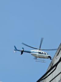 N203HA - hovering over NE DC - by m holmes