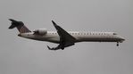 N171GJ @ KORD - GoJet/UE CRJ7 zx - by Florida Metal