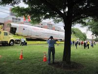 N106US - Fuselage of N106US in front of Rutgers Stadium, Piscataway, NJ, en route to the museum in Charlotte. - by Richard Rabinowitz