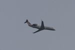 N446AW @ KORD - Air Wisconsin/ American Eagle CRJ2 N446AW operating as AWI6222 from RIC-ORD, arriving at O'Hare in smoke filled skies from the Canadian wildfires - by Mark Kalfas