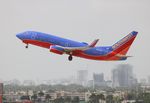 N249WN @ KFLL - SWA 737 canyon blue zx FLL 10R - by Florida Metal