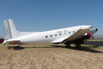 N34AH @ E95 - Parked & neglected at Benson Municipal Airport & showing her age. - by Chris Holtby