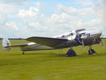 F-AZLL @ EGSU - F-AZLL 1941 Lockheed 12A Electra Junior Duxford - by PhilR