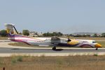 VP-CGD @ LMML - Bombardier DHC-8 VP-CGD NOK Air - by Raymond Zammit