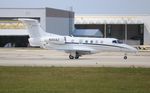 N301AZ @ KFLL - Phenom 300 zx - by Florida Metal