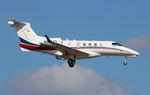 N302AZ @ KORL - Phenom 300 zx - by Florida Metal