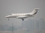 N366QS @ KFLL - Phenom 300 zx FLL 28R - by Florida Metal