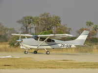 ZS-SOK - Take-off at ABU Airstrip, Okavango Delta / Botswana - by Eva Prueckl