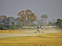 ZS-SOK - Take-off at ABU Airstrip, Okavango Delta / Botswana - by Eva Prueckl