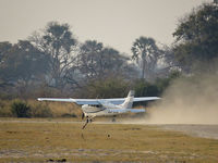 ZS-SOK - Landing at ABU Airstrip, Okavango Delta / Botswana - by Eva Prueckl