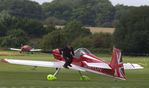 G-RYON @ EGSG - Pilot in a quick dismount from his 1988 Mudry Cap 231 at Stapleford Tawney, Essex - by Chris Holtby