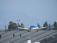N8397L @ 1938 - Over the outer fence - by 30295