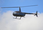 G-MXPI @ EGLK - Robinson R44 Raven II at Blackbushe. Ex OK-SIM - by moxy