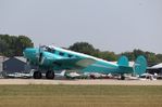 N411J @ KOSH - Beech D18S - by Mark Pasqualino