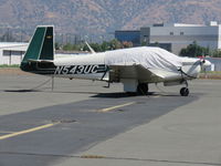 N543UC @ 1938 - Covered & parked - by 30295
