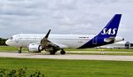 EI-SIO @ EGCC - At Manchester Airport - by Terry Fletcher