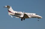 N420QS @ KORL - Phenom 300 zx - by Florida Metal