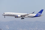 SE-RSA @ KLAX - Final runway 24R at KLAX. - by George Pergaminelis