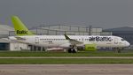 YL-AAP @ EGCC - At Manchester Airport - by Terry Fletcher