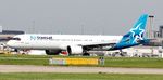 C-GOIM @ EGCC - At Manchester Airport - by Terry Fletcher